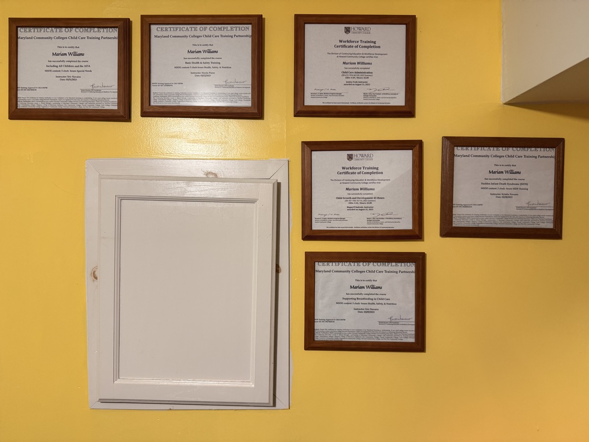 Mariam Williams certifications and training wall